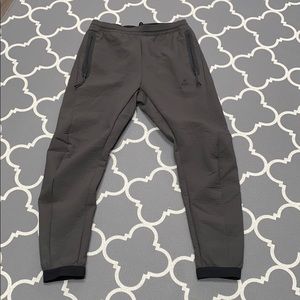 nike tech joggers zippered pockets tapered